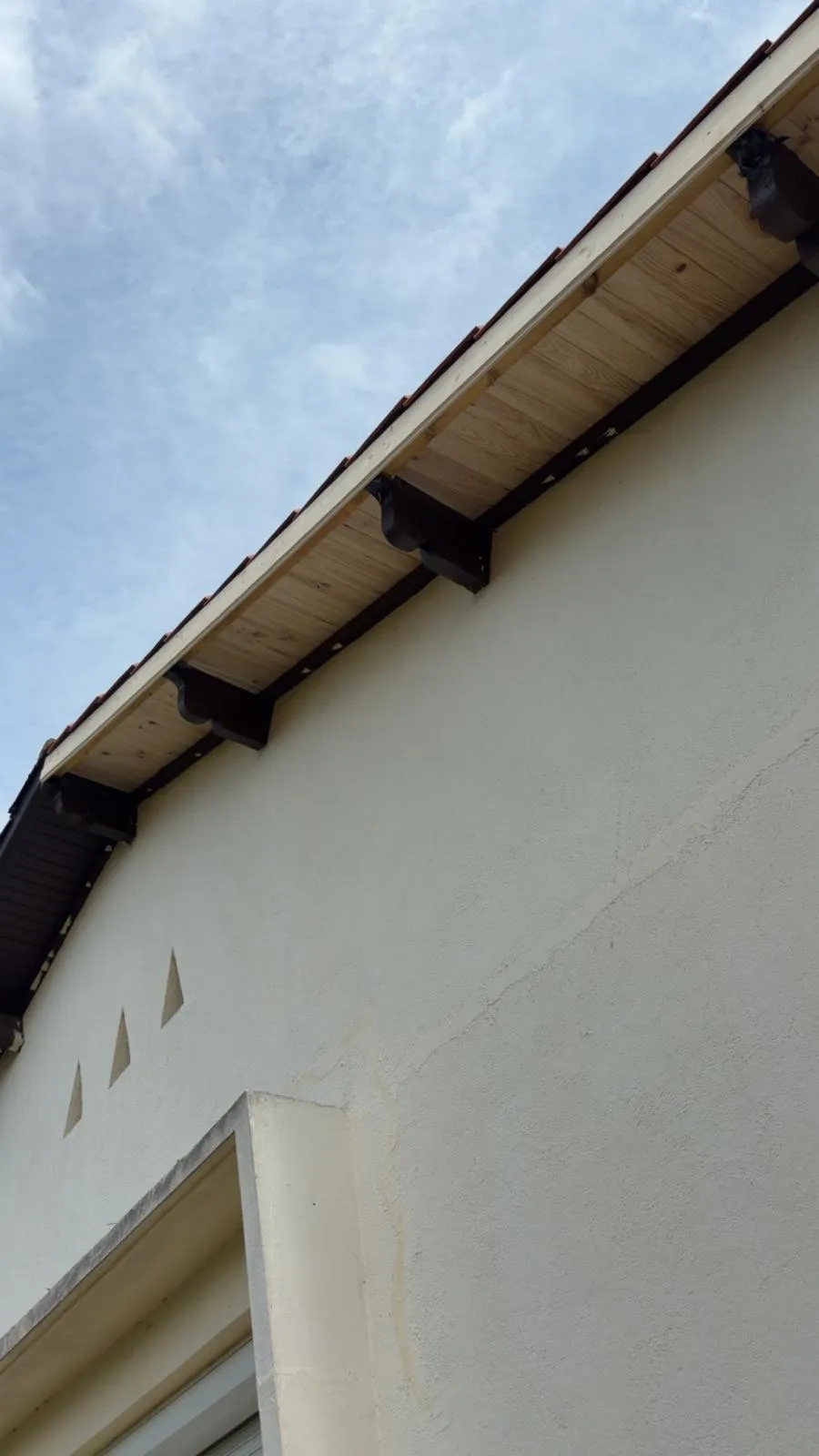 Sous-face de débord de toit à Langon, chevrons repris et protégés
